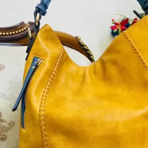 Sabyasachi Leather Tote Bag Women's handbag closeup - Mustard Yellow